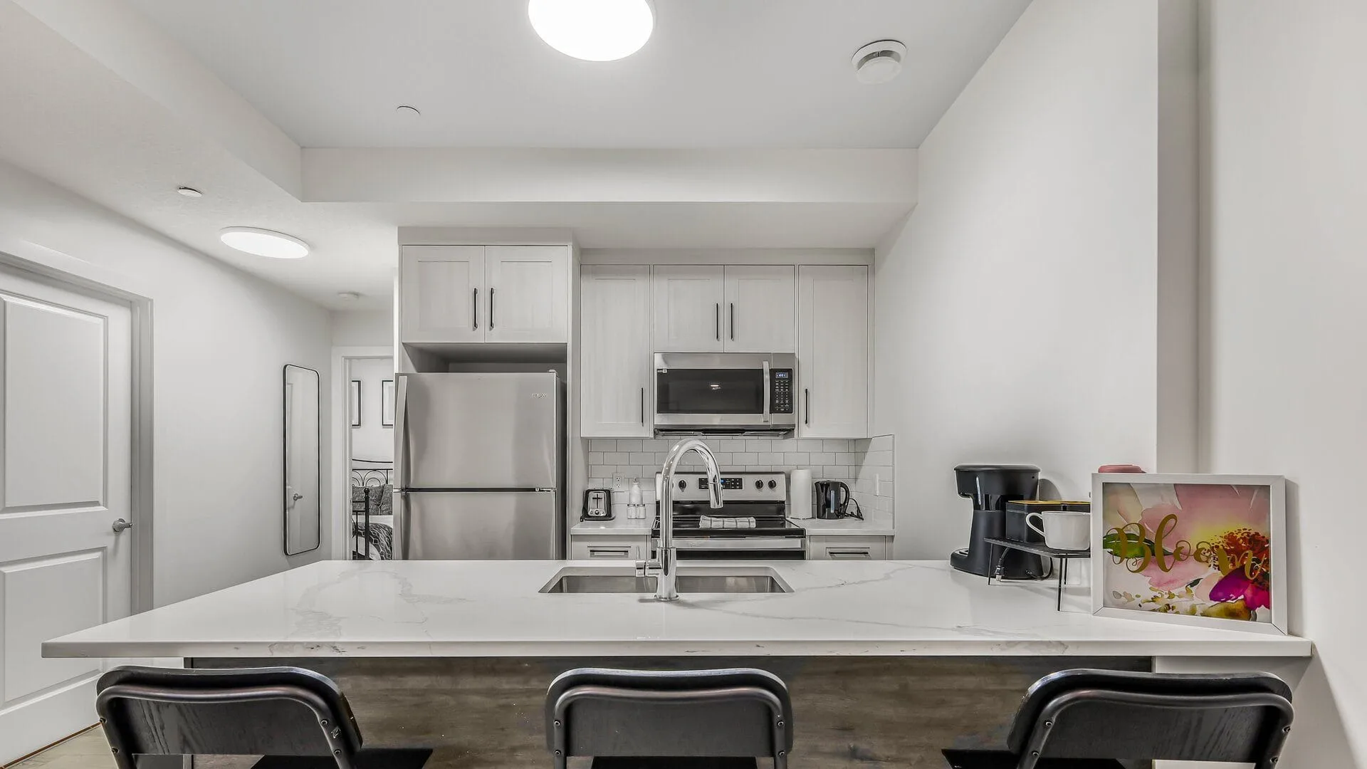 Completed legal secondary suite kitchen by OAF Construction in Calgary